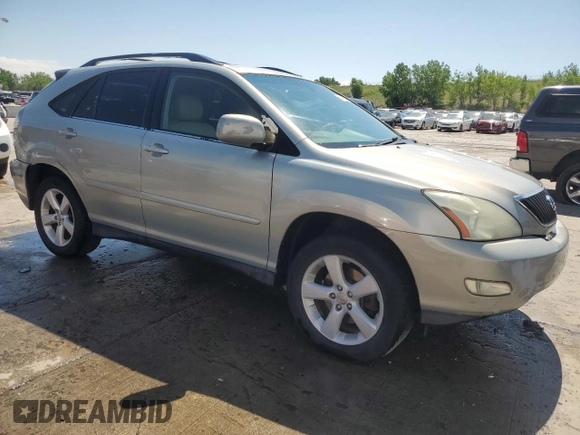 2005 Lexus RX 330 with VIN JTJGA31U350051558, listed as a Copart auction lot 60489215 with 216,702 mi miles and Salvage title. Bid and sale history available at DreamBid. Image 4.