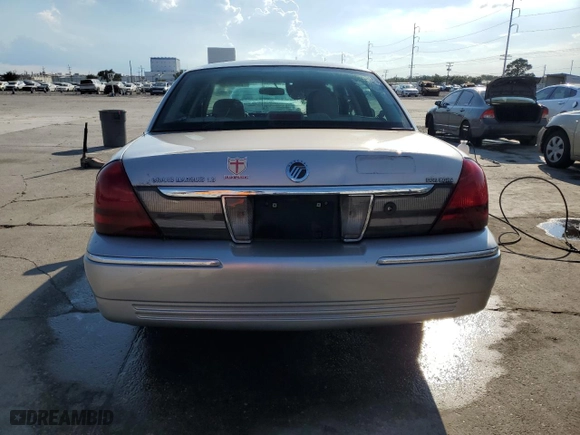 2010 Mercury Grand Marquis LS with VIN 2MEBM7FV0AX602472, listed as a Copart auction lot 72833864 with 73,376 mi miles and Salvage Title. Bid and sale history available at carsss.com. Image 6.
