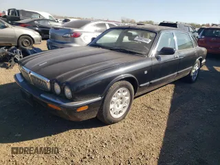 2001 Jaguar XJ with VIN SAJDA23C31LF28667, listed as a Copart auction lot 76983144 with 87,542 mi miles and Clean title. Bid and sale history available at DreamBid. Image 1.
