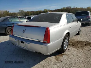 2010 Cadillac DTS w/1SC with VIN 1G6KD5EYXAU126775, listed as a Copart auction lot 77207094 with 100,288 mi miles and Salvage Title. Bid and sale history available at carsss.com. Image 3.
