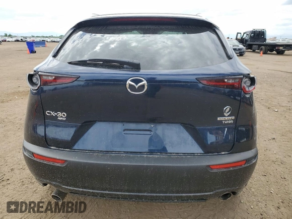 2022 Mazda CX-30 2.5 Turbo with VIN 3MVDMBAYXNM417439, listed as a Copart auction lot 57280884 with 13,590 mi miles and Salvage Title. Bid and sale history available at DreamBid. Image 6.