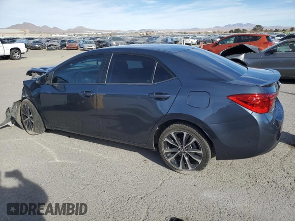 2019 Toyota Corolla L with VIN 2T1BURHE4KC184532, listed as a Copart auction lot 87870635 with 82,357 mi miles and Salvage Title. Bid and sale history available at DreamBid. Image 2.