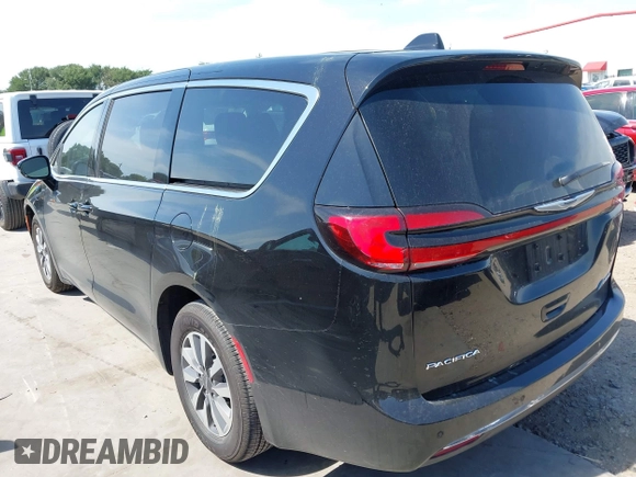 2024 Chrysler Pacifica Hybrid Select z VIN 2C4RC1S73RR185310, wystawiony jako IAAI lot #42246006 z przebiegiem 31 696 mil mil oraz . Historia ofert i sprzedaży dostępna na DreamBid. Obrazek 3.