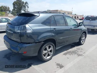 2007 Lexus RX 400h with VIN JTJGW31U372001817, listed as a IAAI auction lot 42047143 with 155,767 mi miles and . Bid and sale history available at DreamBid. Image 4.