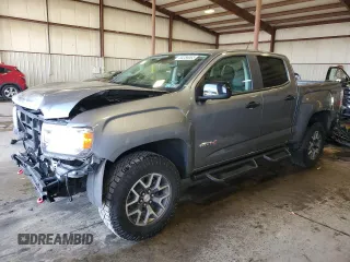 2022 GMC Canyon 4WD AT4 z VIN 1GTG6FEN0N1162393, wystawiony jako Copart lot #55286065 z przebiegiem 55 185 mil mil oraz Szkoda całkowita • Salvage title. Historia ofert i sprzedaży dostępna na DreamBid. Obrazek 1.