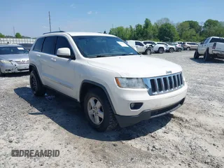 2011 Jeep Grand Cherokee Laredo with VIN 1J4RS4GG5BC573337, listed as a IAAI auction lot 41960369 with 185,518 mi miles and . Bid and sale history available at DreamBid. Image 1.