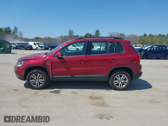 2015 Volkswagen Tiguan SE z VIN WVGBV7AX7FW056002, wystawiony jako IAAI lot #42122641 z przebiegiem 77 037 mil mil oraz . Historia ofert i sprzedaży dostępna na DreamBid. Obrazek 14.