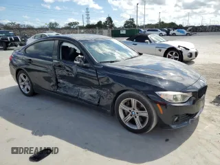 2015 BMW 4 Series 428i with VIN WBA4A5C55FD410360, listed as a Copart auction lot 44335485 with 144,997 mi miles and Salvage Title. Bid and sale history available at DreamBid. Image 4.