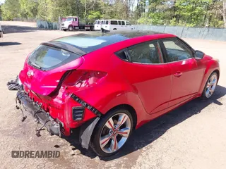 2012 Hyundai Veloster w/Gray Int z VIN KMHTC6AD0CU048339, wystawiony jako IAAI lot #42040008 z przebiegiem 117 895 mil mil oraz . Historia ofert i sprzedaży dostępna na DreamBid. Obrazek 4.