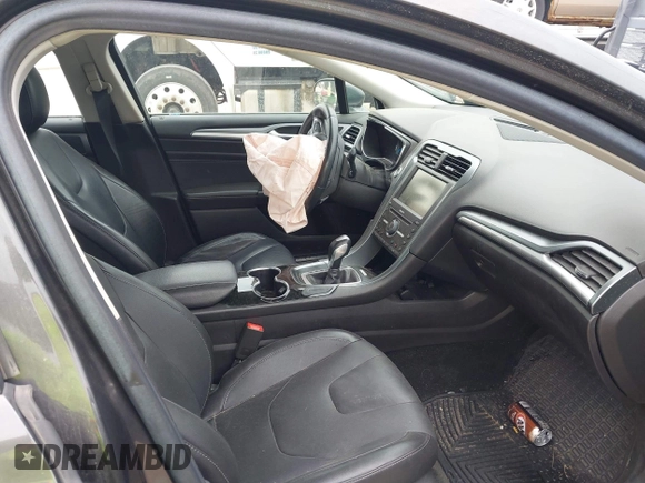 2016 Ford Fusion Titanium with VIN 3FA6P0D97GR133823, listed as a IAAI auction lot 42429708 with 166,105 mi miles and . Bid and sale history available at DreamBid. Image 5.