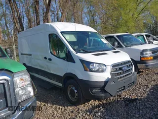 2020 Ford Transit Cargo z VIN 1FTBR1C84LKB56363, wystawiony jako IAAI lot #41936891 z przebiegiem 78 819 mil mil oraz . Historia ofert i sprzedaży dostępna na DreamBid. Obrazek 1.
