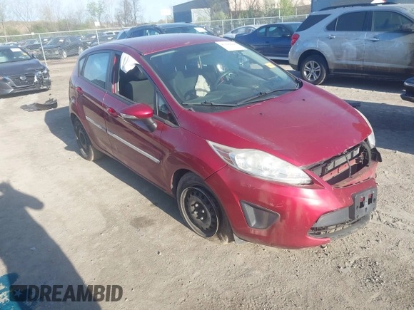 2013 Ford Fiesta SE with VIN 3FADP4EJ0DM171765, listed as a IAAI auction lot 42106666 with 149,873 mi miles and . Bid and sale history available at DreamBid. Image 1.