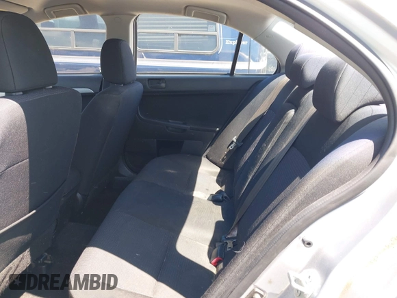 2010 Mitsubishi Lancer ES with VIN JA32U2FU1AU006059, listed as a IAAI auction lot 42118256 with 174,207 mi miles. Bid and sale history available at carsss.com. Image 8.