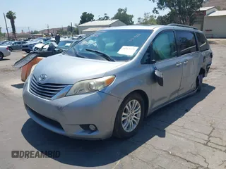 2015 Toyota Sienna XLE with VIN 5TDYK3DC0FS589947, listed as a IAAI auction lot 36567379 with 130,969 mi miles and . Bid and sale history available at DreamBid. Image 17.