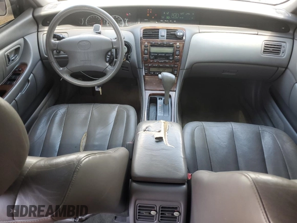 2001 Toyota Avalon XL with VIN 4T1BF28B11U171919, listed as a Copart auction lot 55977855 with 189,840 mi miles and Salvage Title. Bid and sale history available at DreamBid. Image 8.