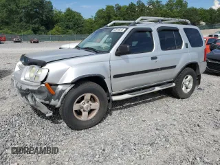 2004 Nissan Xterra XE with VIN 5N1ED28T44C621293, listed as a Copart auction lot 63514815 with 164,965 mi miles and Salvage title. Bid and sale history available at DreamBid. Image 1.