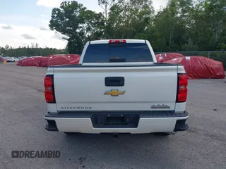 2014 Chevrolet Silverado 1500 High Country with VIN 3GCUKTEC4EG401571, listed as a IAAI auction lot 41984349 with 104,221 mi miles and . Bid and sale history available at DreamBid. Image 15.