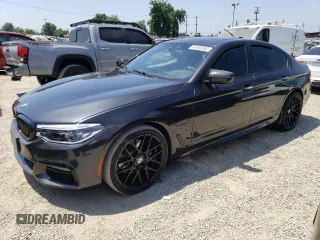2018 BMW 5 Series 530e with VIN WBAJA9C55JG623181, listed as a Copart auction lot 61593983 with 63,577 mi miles and . Bid and sale history available at DreamBid. Image 1.