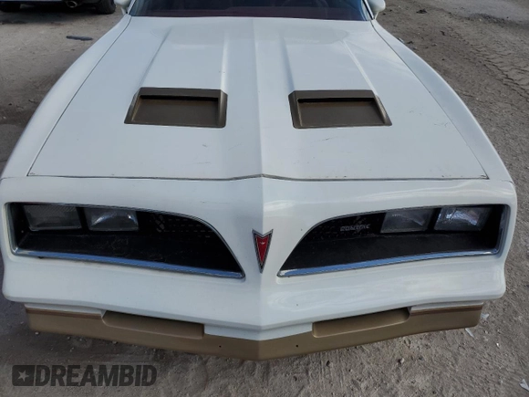 1978 Pontiac Firebird с VIN 2U87K8L123850, выставлен на аукционе Copart как лот 79076374 с пробегом 64 829 миль миль и Списание • Salvage title. История ставок и продаж доступна на DreamBid. Изображение 11.