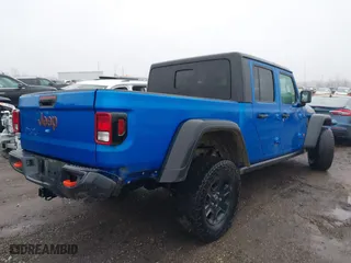 2022 Jeep Gladiator Mojave with VIN 1C6JJTEG1NL128530, listed as a IAAI auction lot 41111344 with 56,119 mi miles. Bid and sale history available at carsss.com. Image 4.