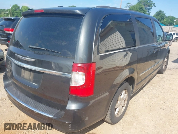2012 Chrysler Town & Country Touring z VIN 2C4RC1BGXCR312741, wystawiony jako IAAI lot #42229837 z przebiegiem 189 806 mil mil oraz . Historia ofert i sprzedaży dostępna na DreamBid. Obrazek 4.