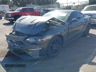2019 Ford Mustang EcoBoost with VIN 1FA6P8TH8K5106195, listed as a IAAI auction lot 41688821 with 64,306 mi miles and . Bid and sale history available at carsss.com. Image 2.