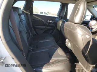 2016 Jeep Cherokee Trailhawk z VIN 1C4PJMBS2GW334801, wystawiony jako Copart lot #87434324 z przebiegiem 92 887 mil mil oraz Szkoda całkowita • Salvage title. Historia ofert i sprzedaży dostępna na DreamBid. Obrazek 11.