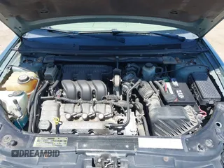 2005 Ford Five Hundred SE z VIN 1FAFP23185G168799, wystawiony jako IAAI lot #42202907 z przebiegiem Nie podano mil oraz . Historia ofert i sprzedaży dostępna na DreamBid. Obrazek 10.