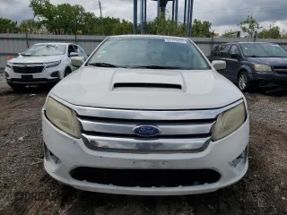 2012 Ford Fusion SE z VIN 3FAHP0HA1CR353093, wystawiony jako Copart lot #57113615 z przebiegiem 120 769 mil mil oraz Szkoda całkowita • Salvage title. Historia ofert i sprzedaży dostępna na DreamBid. Obrazek 5.