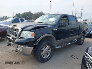 2004 Ford F-150 XLT with VIN 1FTPW14554KC93459, listed as a IAAI auction lot 41673091 with 239,519 mi miles. Bid and sale history available at carsss.com. Image 2.