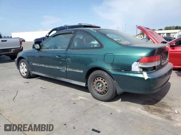 1999 Honda Civic EX with VIN 1HGEJ8243XL083130, listed as a Copart auction lot 60248885 with 331,458 mi miles and Salvage title. Bid and sale history available at DreamBid. Image 2.