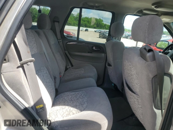 2002 GMC Envoy SLT z VIN 1GKDS13S722253150, wystawiony jako Copart lot #56255185 z przebiegiem 174 198 mil mil oraz Szkoda całkowita • Salvage title. Historia ofert i sprzedaży dostępna na DreamBid. Obrazek 11.