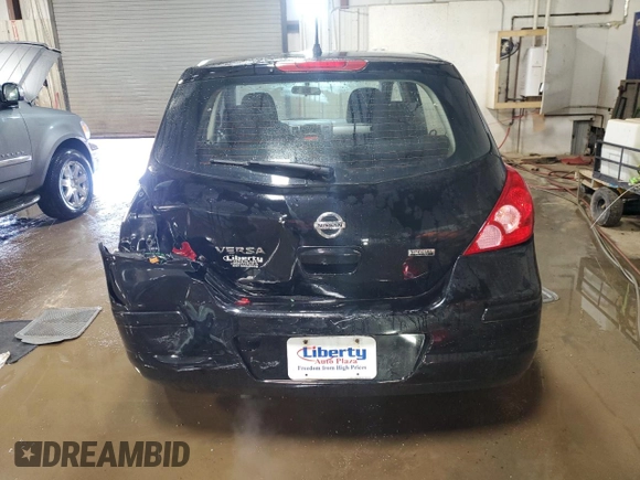 2012 Nissan Versa S with VIN 3N1BC1CP7CK805539, listed as a Copart auction lot 48531765 with 51,058 mi miles and Salvage Title. Bid and sale history available at carsss.com. Image 6.
