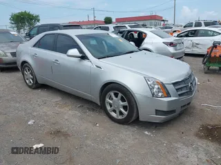 2009 Cadillac CTS RWD z VIN 1G6DF577690154423, wystawiony jako IAAI lot #42436518 z przebiegiem 209 917 mil mil oraz . Historia ofert i sprzedaży dostępna na DreamBid. Obrazek 1.