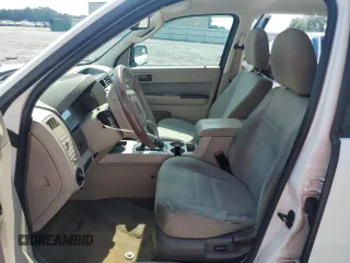 2012 Ford Escape XLT with VIN 1FMCU9D73CKC29497, listed as a Copart auction lot 63211965 with 142,134 mi miles and Salvage title. Bid and sale history available at DreamBid. Image 7.