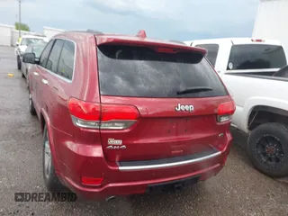2014 Jeep Grand Cherokee Overland with VIN 1C4RJFCG9EC460165, listed as a IAAI auction lot 42092137 with 131,802 mi miles and . Bid and sale history available at DreamBid. Image 17.