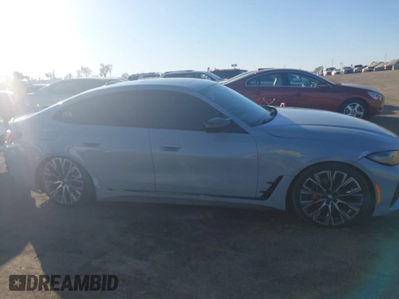 2023 BMW 4 Series M440i with VIN WBA63AW05PFP60184, listed as a IAAI auction lot 41045811 with 12,141 mi miles and . Bid and sale history available at DreamBid. Image 14.