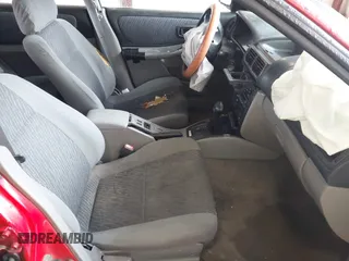 1999 Subaru Impreza Outback Special Sports z VIN JF1GF4854XH815209, wystawiony jako IAAI lot #42235555 z przebiegiem 294 867 mil mil oraz . Historia ofert i sprzedaży dostępna na DreamBid. Obrazek 5.