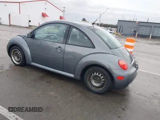 2004 Volkswagen New Beetle Coupe GL with VIN 3VWBK21C34M400724, listed as a IAAI auction lot 41658126 with 150,150 mi miles. Bid and sale history available at carsss.com. Image 3.
