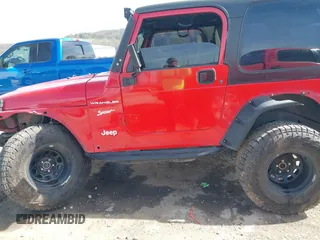 2002 Jeep Wrangler Sport with VIN 1J4FA49S42P771262, listed as a IAAI auction lot 41819403 with 132,871 mi miles. Bid and sale history available at carsss.com. Image 15.