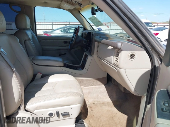 2005 Cadillac Escalade with VIN 1GYEK63NX5R141147, listed as a IAAI auction lot 42518716 with 231,540 mi miles and . Bid and sale history available at DreamBid. Image 5.