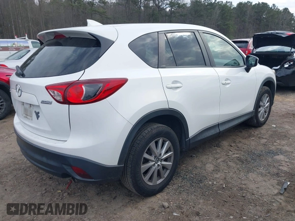 2016 Mazda CX-5 Touring with VIN JM3KE2CY5G0791537, listed as a IAAI auction lot 41396276 with 42,095 mi miles. Bid and sale history available at carsss.com. Image 4.