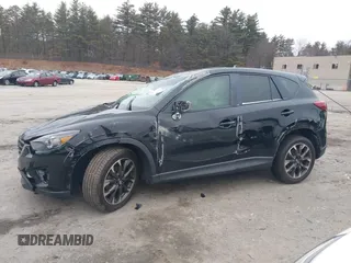 2016 Mazda CX-5 Grand Touring with VIN JM3KE4DY1G0685449, listed as a IAAI auction lot 41162840 with 134,525 mi miles. Bid and sale history available at carsss.com. Image 15.