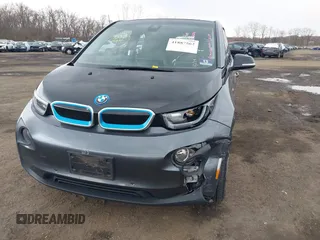 2017 BMW i3 z VIN WBY1Z8C39HV891353, wystawiony jako IAAI lot #41887562 z przebiegiem 82 295 mil mil oraz . Historia ofert i sprzedaży dostępna na DreamBid. Obrazek 19.