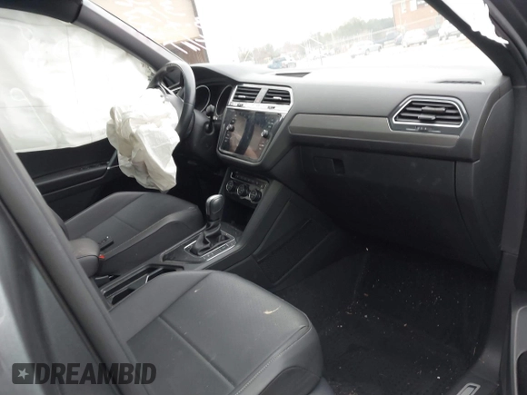 2020 Volkswagen Tiguan SE with VIN 3VV3B7AX7LM163193, listed as a IAAI auction lot 41751571 with 32,352 mi miles and . Bid and sale history available at DreamBid. Image 5.
