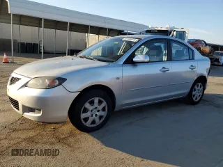 2009 Mazda Mazda3 i Touring Value with VIN JM1BK32G791250048, listed as a Copart auction lot 87440814 with 114,948 mi miles and Salvage Title. Bid and sale history available at carsss.com. Image 1.
