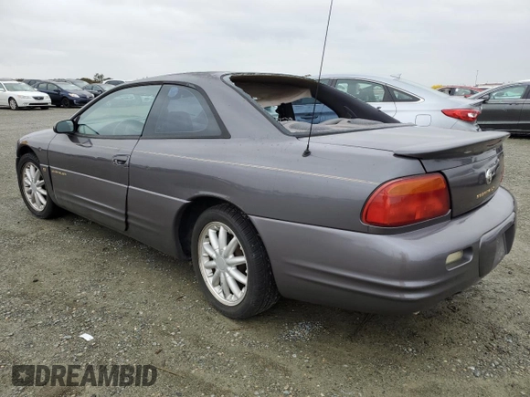 1997 Chrysler Sebring LXi z VIN 4C3AU52N2VE183090, wystawiony jako Copart lot #81855454 z przebiegiem 157 590 mil mil oraz Szkoda całkowita • Salvage title. Historia ofert i sprzedaży dostępna na DreamBid. Obrazek 2.
