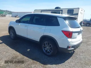 2022 Honda Passport EX-L z VIN 5FNYF8H52NB009758, wystawiony jako IAAI lot #42359419 z przebiegiem 25 845 mil mil oraz . Historia ofert i sprzedaży dostępna na DreamBid. Obrazek 3.