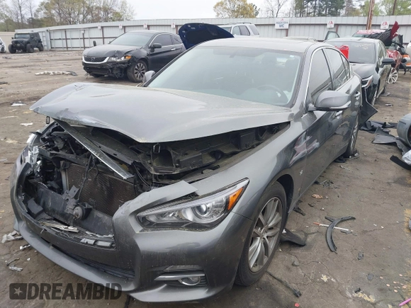 2014 Infiniti Q50 Premium z VIN JN1BV7AP8EM674625, wystawiony jako IAAI lot #41922173 z przebiegiem Nie podano mil oraz . Historia ofert i sprzedaży dostępna na DreamBid. Obrazek 17.