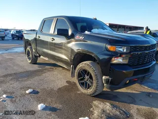 2019 Chevrolet Silverado 1500 Custom Trail Boss with VIN 3GCPYCEH7KG121386, listed as a IAAI auction lot 41357405 with 100,355 mi miles. Bid and sale history available at carsss.com. Image 1.